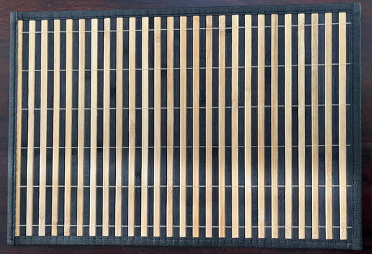 Set of 6 bamboo woven placemats in dark brown with natural stripes, perfect for rustic and eco-friendly dining