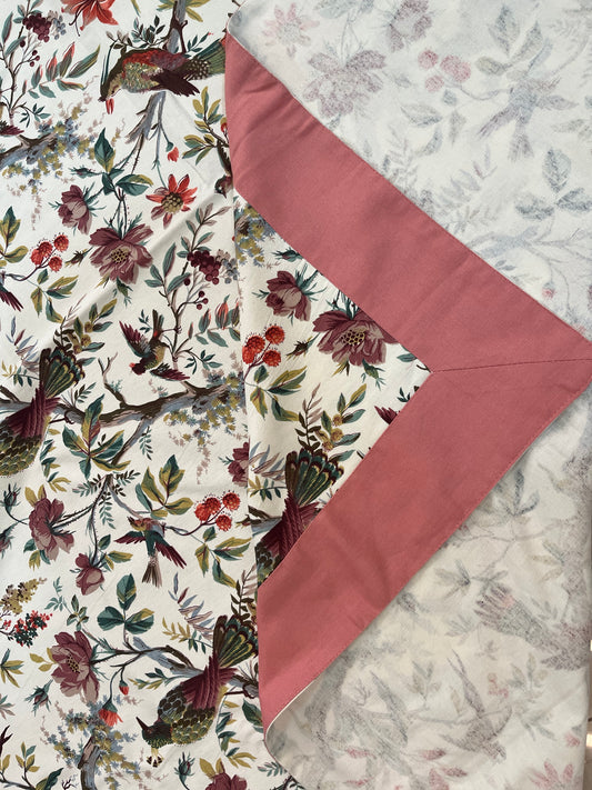 Cotton dining tablecloth featuring a vintage botanical design with hummingbirds, adding a charming nature-inspired touch to your table