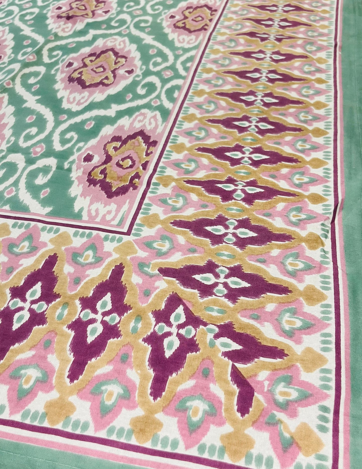 Elegant 6-seater decorative dining table cover with Ikat print in green and purple floral design