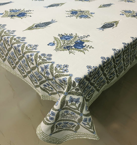 Floral block print dining cotton tablecloth with a traditional blue and green design on a white background
