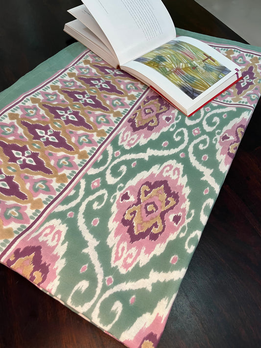 Stylish Ikat print dining table cover in green and purple, perfect for a 6-seater table
