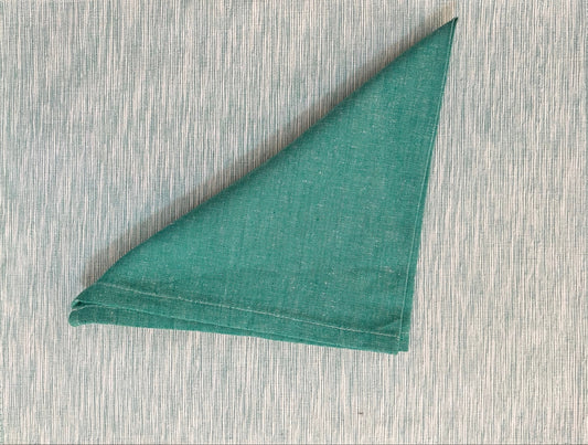 Set of 6 placemats and napkins featuring a teal green woven design, perfect for elegant and coordinated table settings