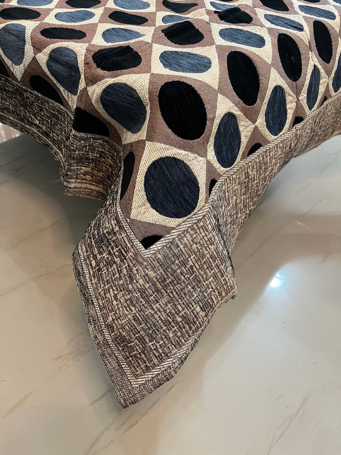 Premium jacquard table cover in navy blue and brown with an elegant polka dot design, perfect for stylish dining spaces